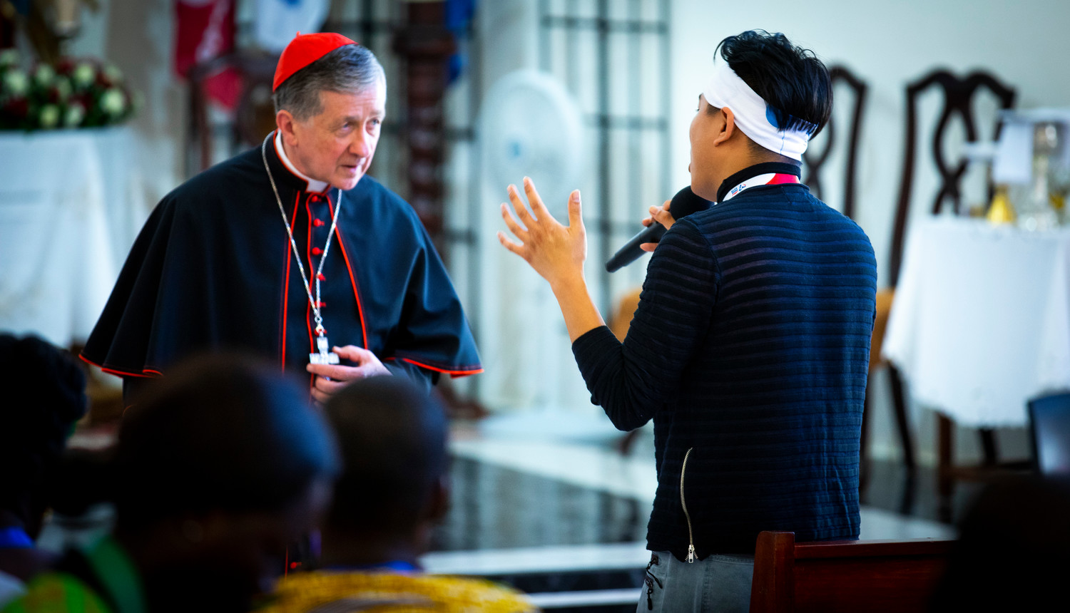 Chicago Cardinal Blase J. Cupich takes a question from a Malaysian pilgrim during a World Youth Day catechesis session at the Parish of Our Mother of Perpetual Help in Panama City Jan. 25, 2019.